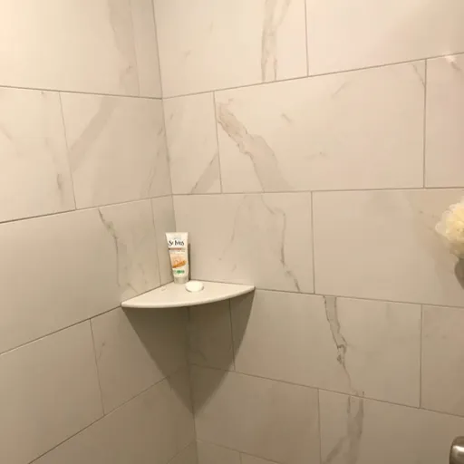 large subway tile installation in a shower 